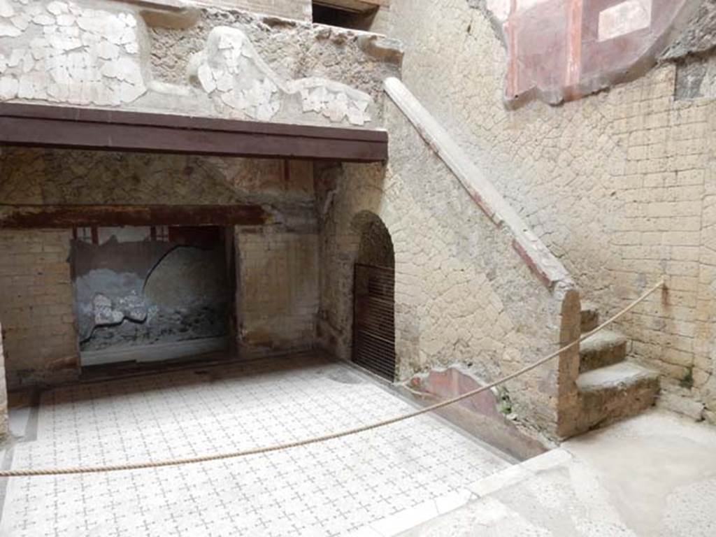 V.8 Herculaneum, May 2018. Area 4, looking north across raised courtyard towards doorway to room 5.
Photo courtesy of Buzz Ferebee.
